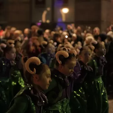  Children in costumes dancing in the Halloween Parade in Derry, Northern Ireland