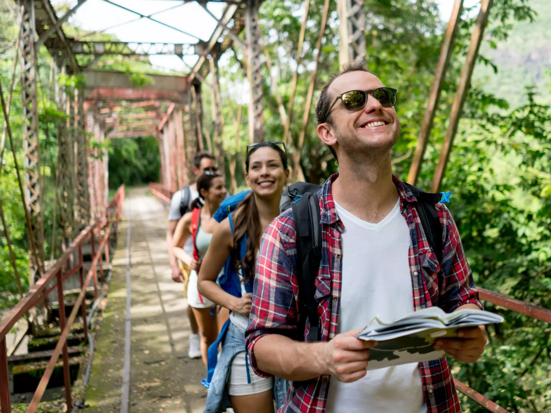 Group hiking through forest in Colombia
828991756