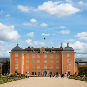 Gardens and facade of the Schwetzingen Palace (Schloss Schwetzingen), ancient summer residence of the Electors Palatine Charles III Philip and Charles IV Theodore in Heidelberg, Germany.