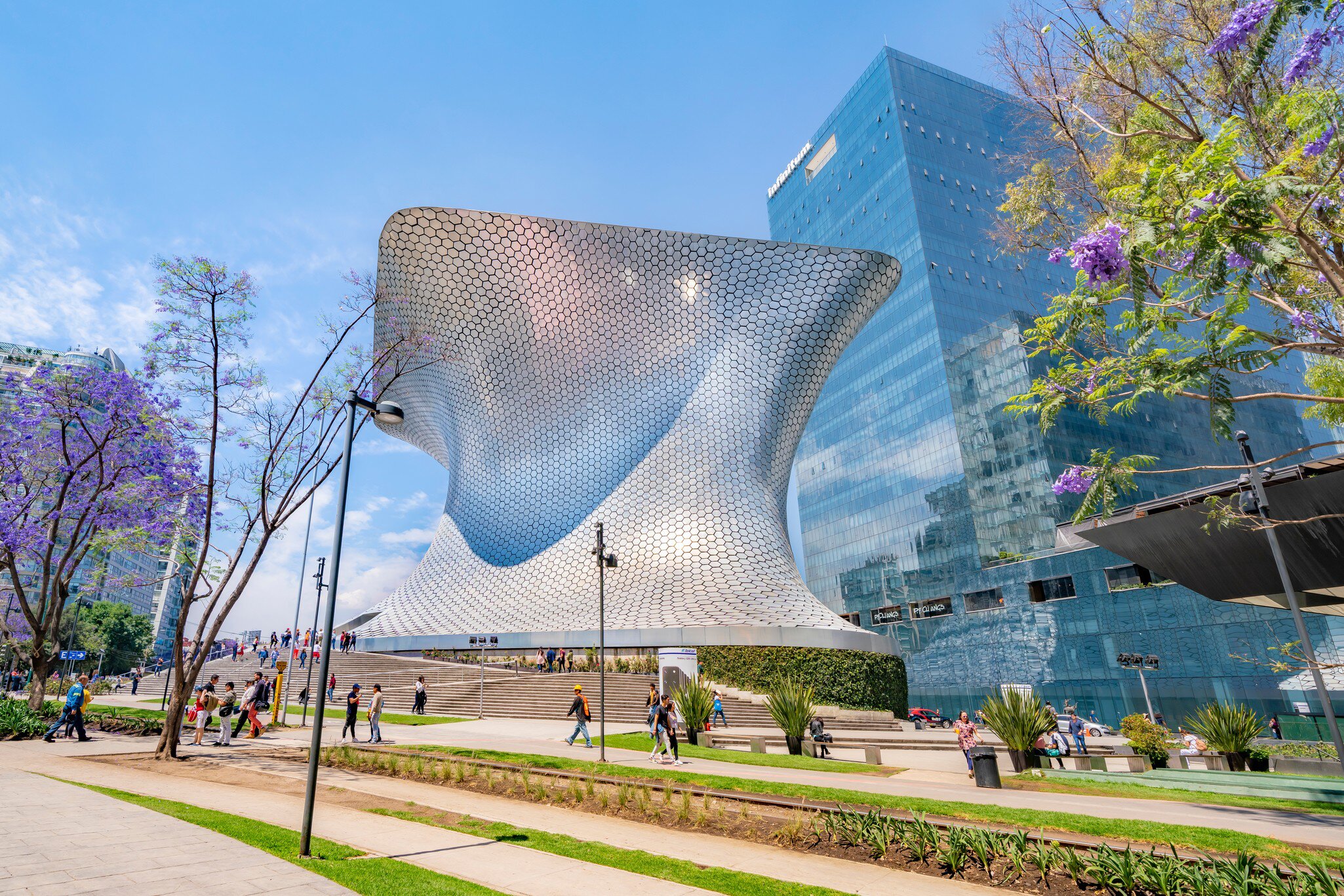 Exterior view of the Museo Soumaya on a sunny day in Mexico City.
