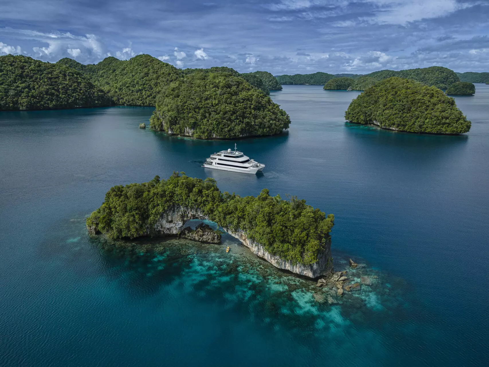 Four Seasons Explorer Palau docked amid the Rock Islands