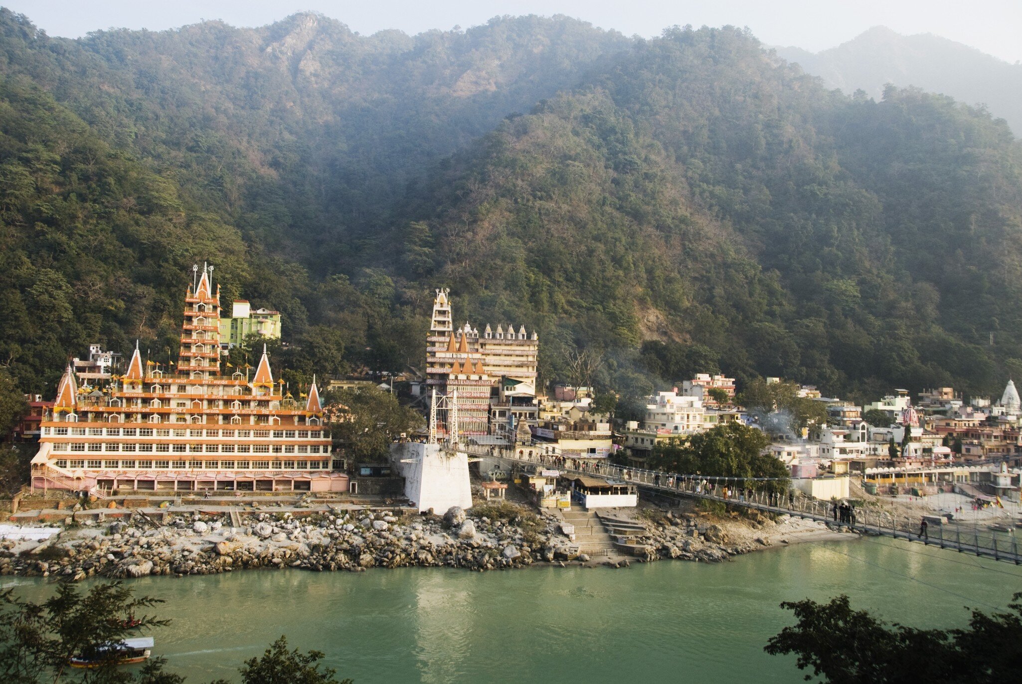 Temples at the riverbank, Swarg Niwas Temple, Lakshman Jhula, Ganges River, Rishikesh, Dehradun District, Uttarakhand, India