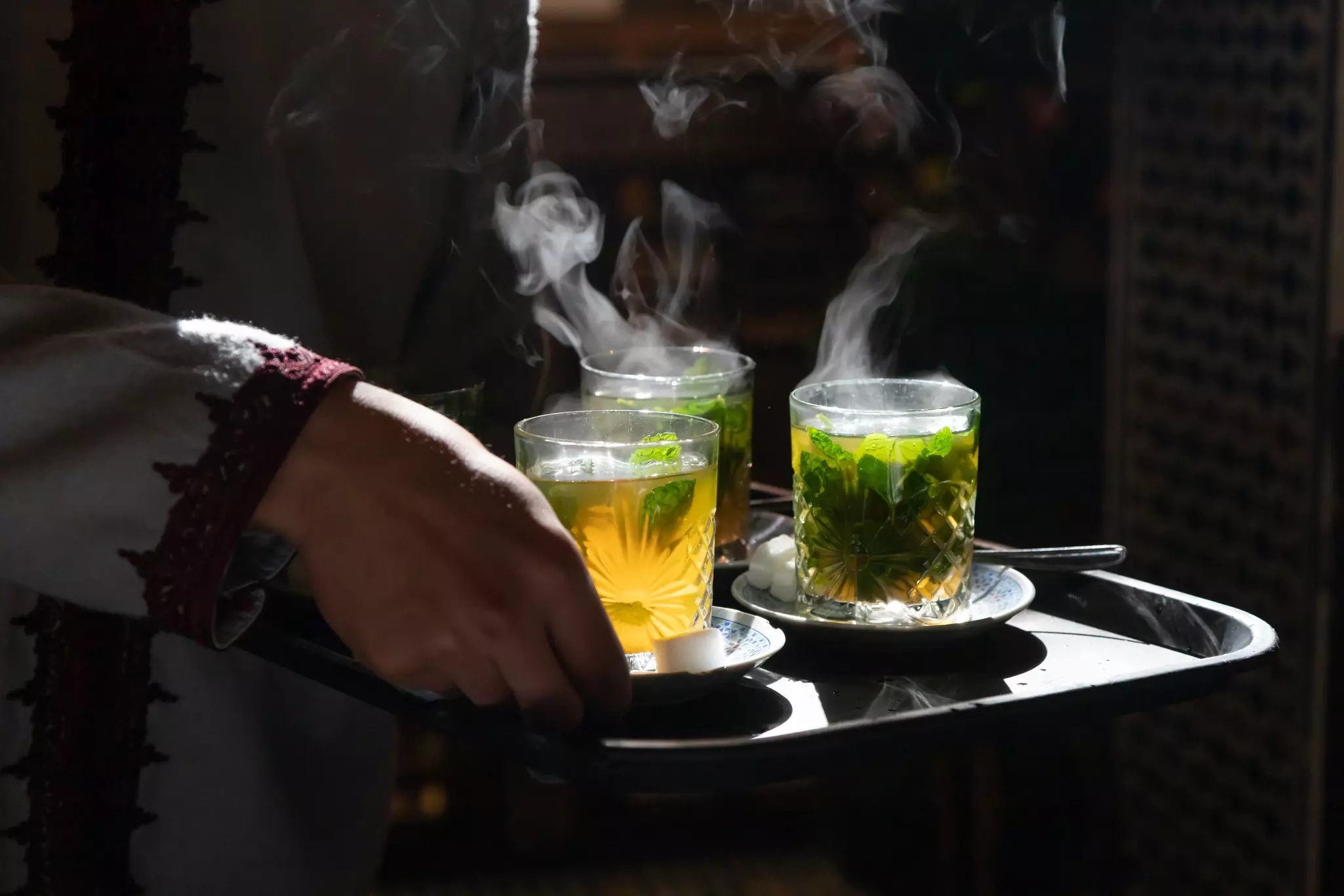 Steaming glasses of traditional mint tea. Keith Barnes/Shutterstock