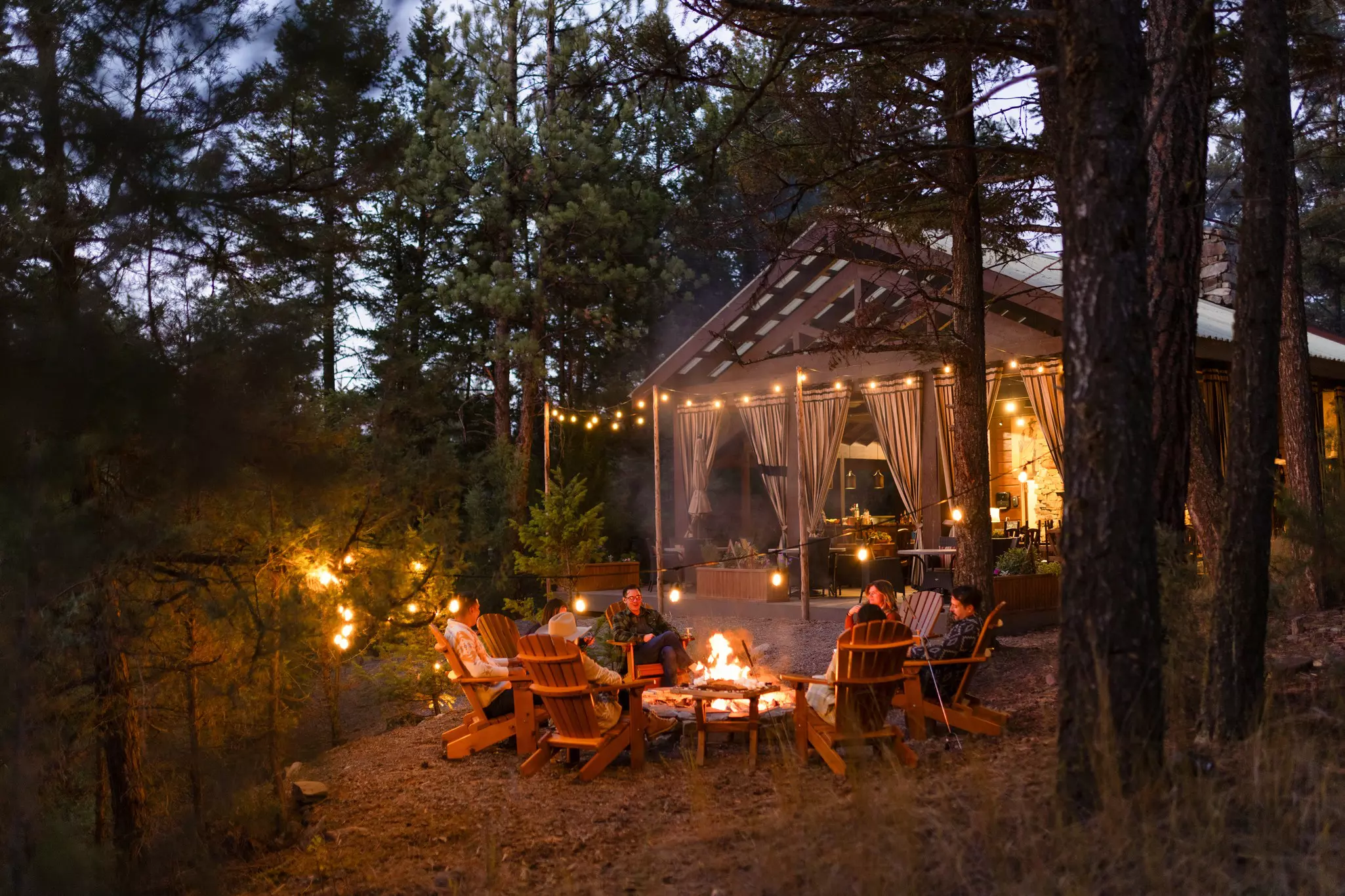 Campfire outside glamping tent