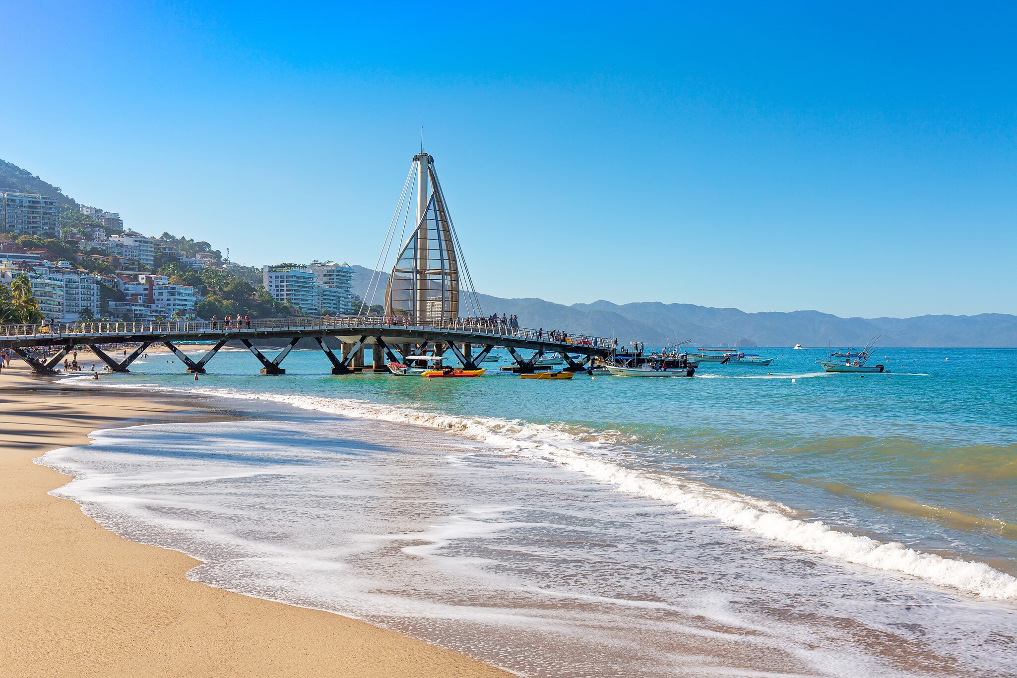 The futuristic pier at Playa De Los Muertos beach in Puerto Vallarta, Mexico.