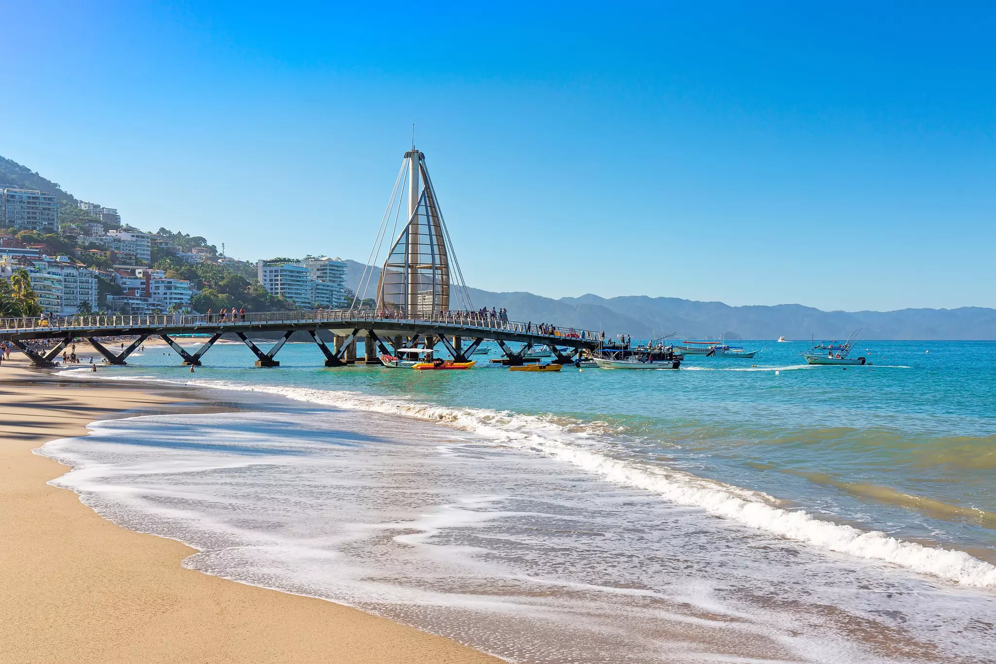 Puerto Vallarta, Mexico-20 December, 2019: Playa De Los Muertos beach and pier close to famous Puerto Vallarta Malecon, the city largest public beach, License Type: media, Download Time: 2026-01-21T23:25:24.000Z, User: LP_YKhanna, Editorial: true, purchase_order: 65050 - Digital Destinations and Articles, job: LP, client: App Content, other: Yuvraj Khanna