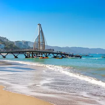 The futuristic pier at Playa De Los Muertos beach in Puerto Vallarta, Mexico.