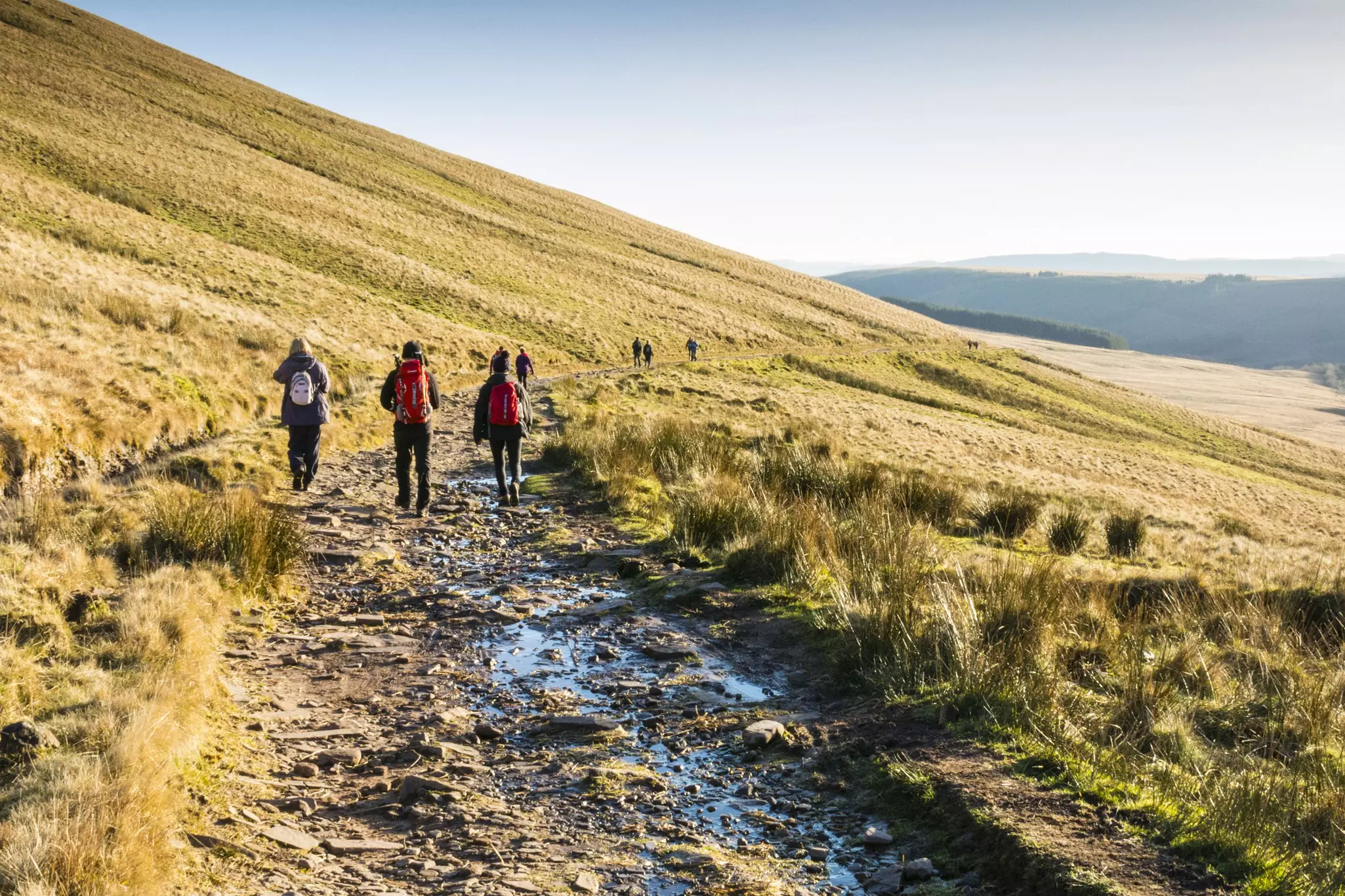 Walkers on Pen-y-Fan in the Brecon Beacons National Park in South Wales, UK.