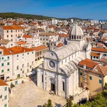 A view over streets of tall houses around St James Cathedral in Šibenik, Croatia. 