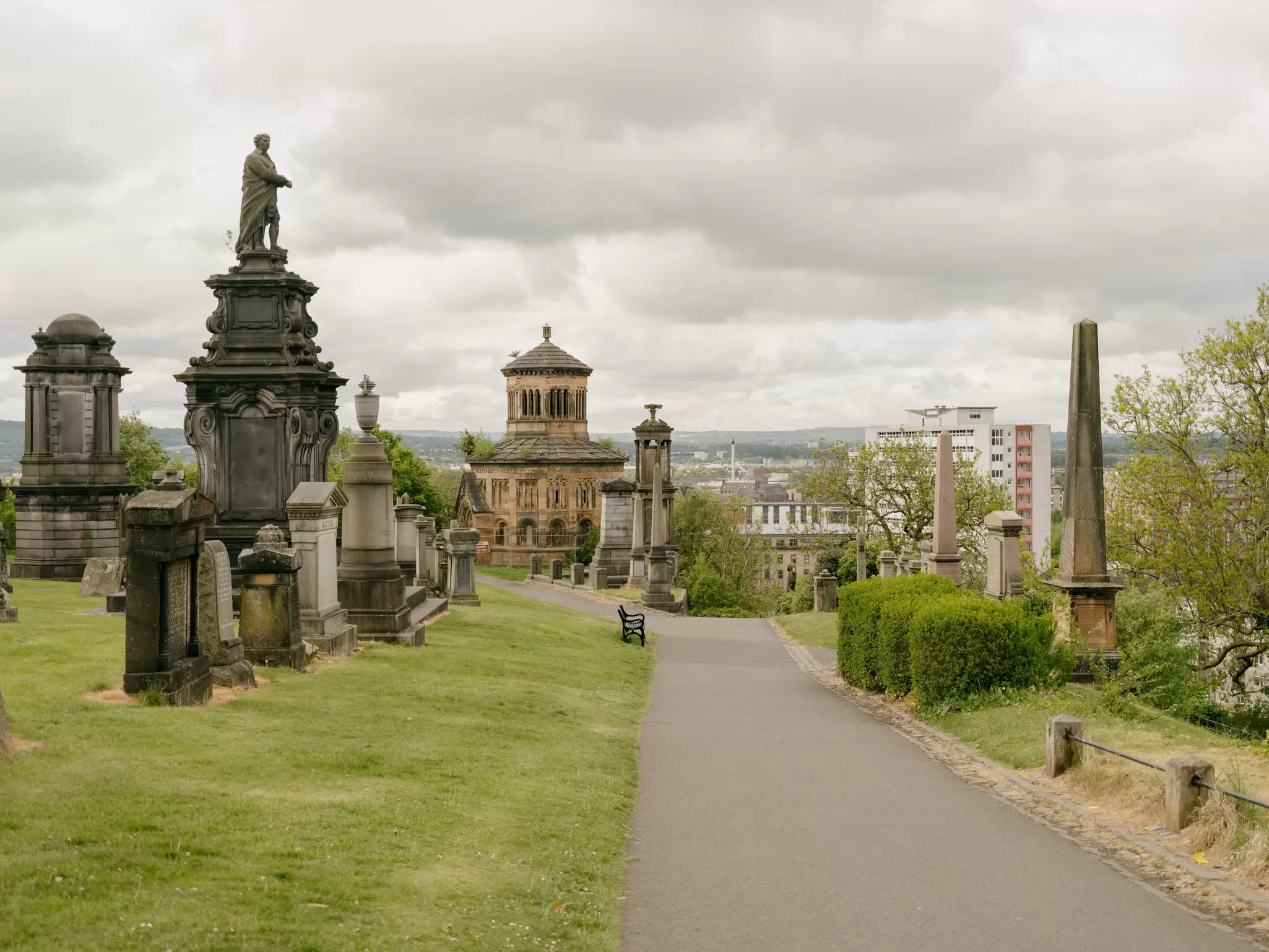 Gravestones and markers in a hilltop cemetery: Glasgow Necropolis, Scotland
