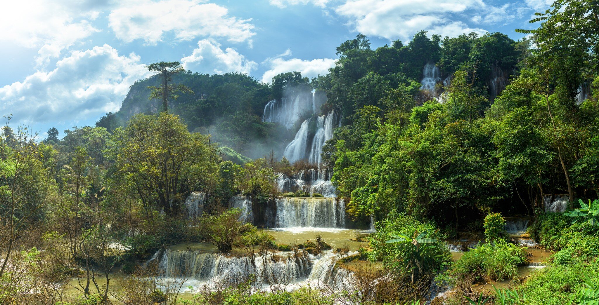 Panoramic beautiful deep forest Thi Lo Su Waterfall into the Umphang Wildlife Sanctuary in Tak Province in northwestern Thailand.