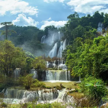 Panoramic beautiful deep forest Thi Lo Su Waterfall into the Umphang Wildlife Sanctuary in Tak Province in northwestern Thailand.
