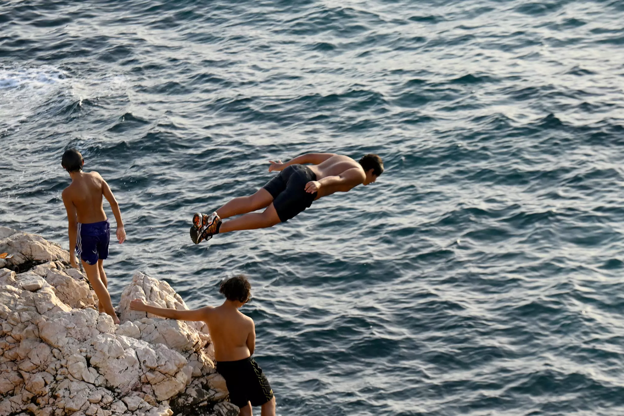 Frequent dips are one way locals are escaping the heat wave engulfing the South of France © Nicolas Tucat / Getty Images