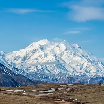 DENALI NATIONAL PARK, ALASKA, USA - JUNE 9 2013: Mt McKinley on a clear day on June 9 2013 in Alaska.  Mt McKinley is the highest mountain in North America and on August 28 2015 was renamed to Denali.