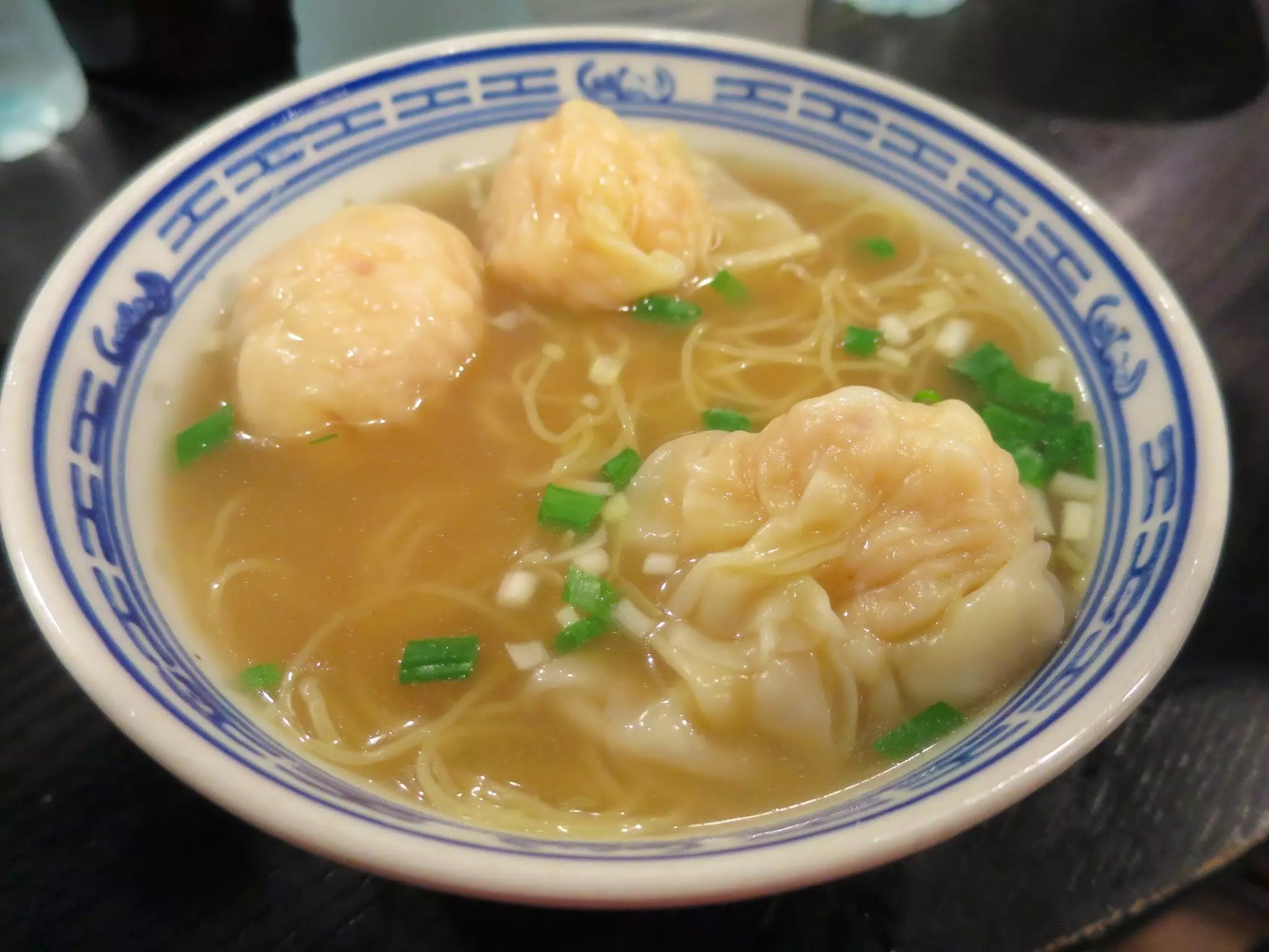 A bowkl of Wonton soup noodles in Hong Kong.