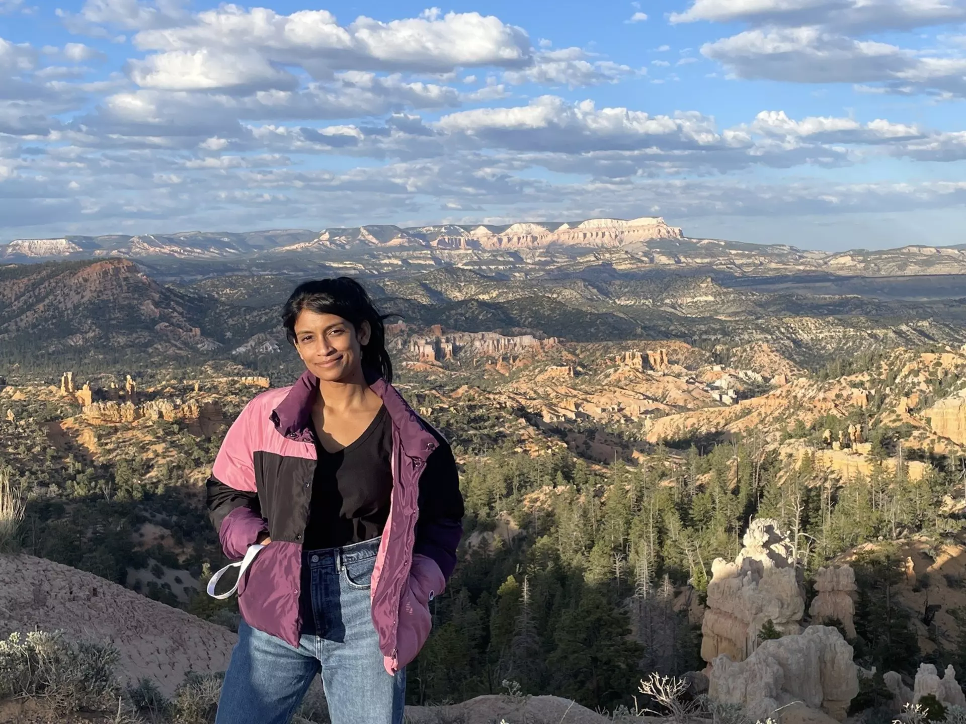 Stopping for a snap at a scenic overlook atop Bryce Canyon, one of Utah’s Mighty Five national parks © Deepa Lakshmin / Lonely Planet