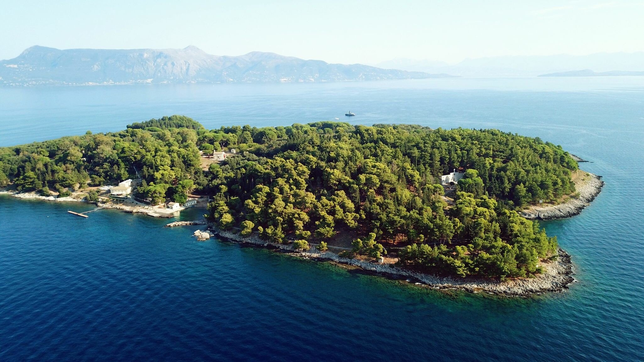 Aerial drone bird's eye view photo of iconic historical small island of Vidos a few nautical miles away from Corfu old town, Corfu island, Ionian, Greece; Shutterstock ID 1201132525; your: Bridget Brown; gl: 65050; netsuite: Online Editorial; full...