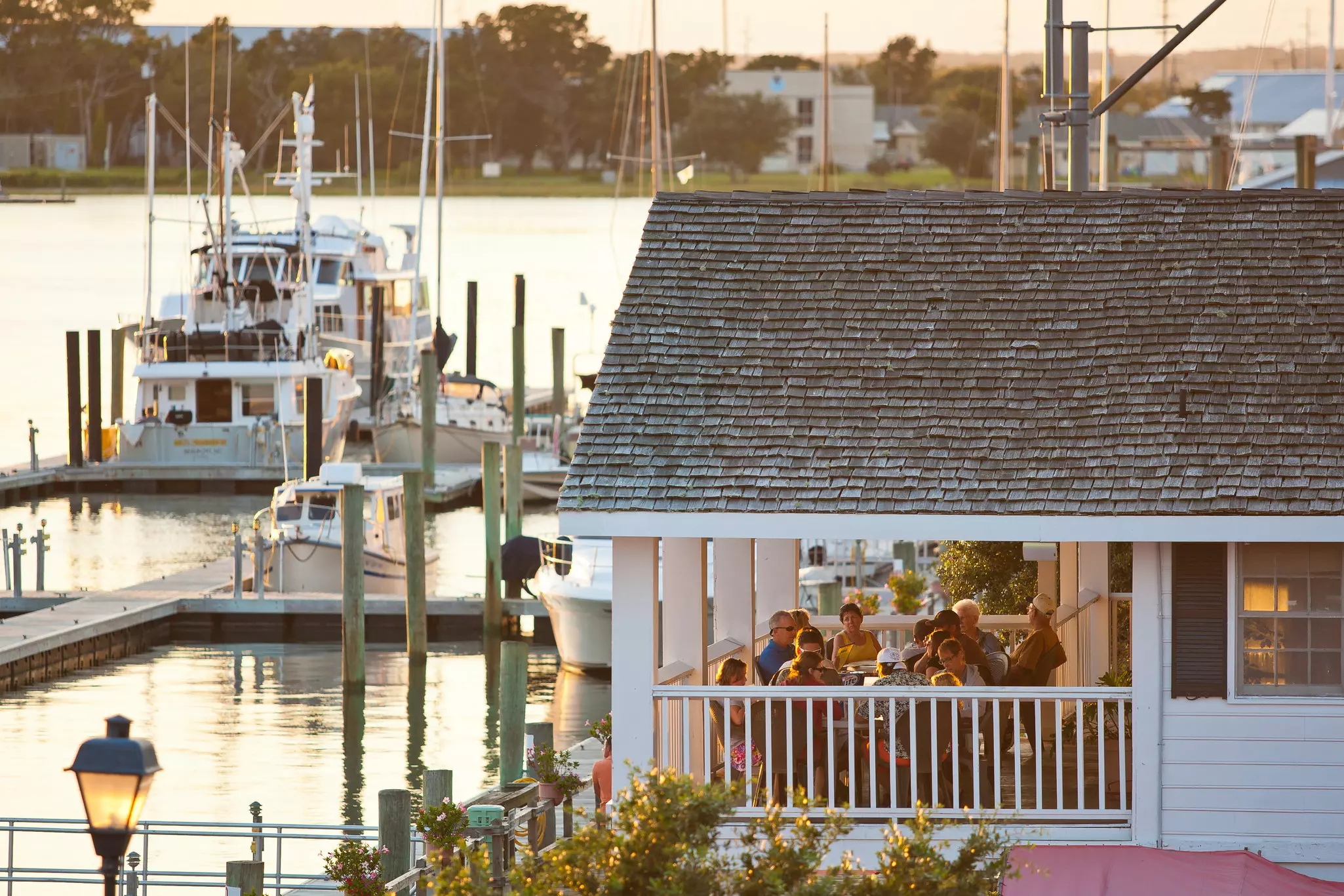 Waterfront dining on a covered terrace