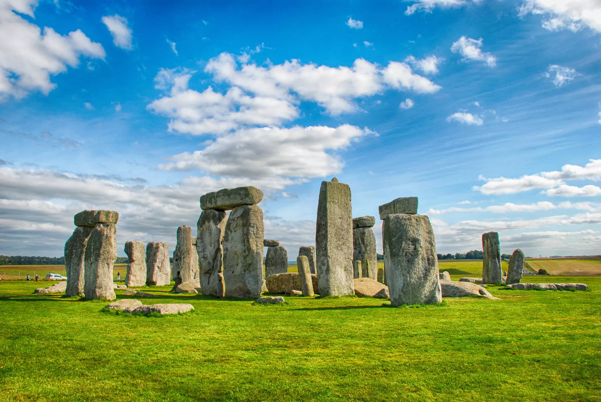 View of the stone of Stonehenge under a blue sky, England.