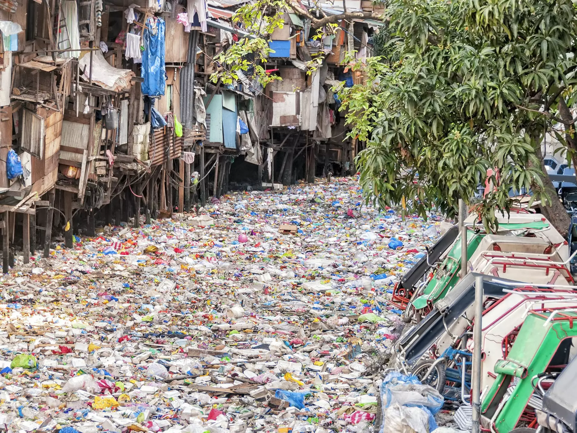 Shanties on stilts standing on a polluted river in the Philippines (stock photo) Getty Images