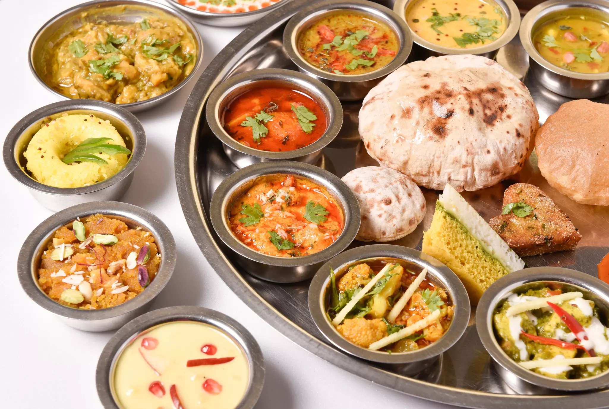 Rajasthani thali platter with varying food from the culture. ©grey color/Shutterstock