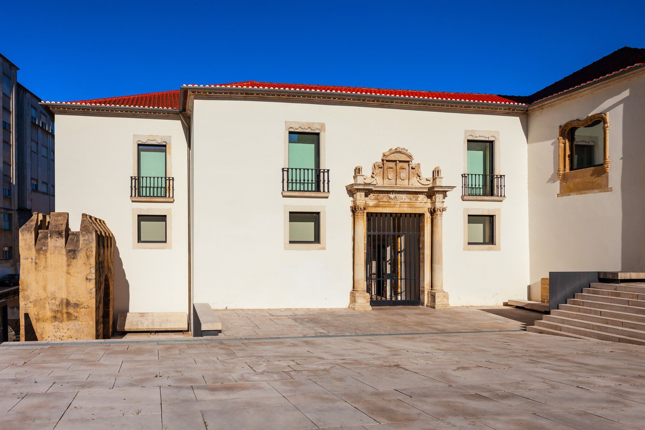 View of the entrance to the Museu Nacional de Machado de Castro on a sunny day in Coimbra, Portugal.