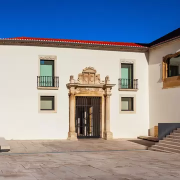 View of the entrance to the Museu Nacional de Machado de Castro on a sunny day in Coimbra, Portugal.