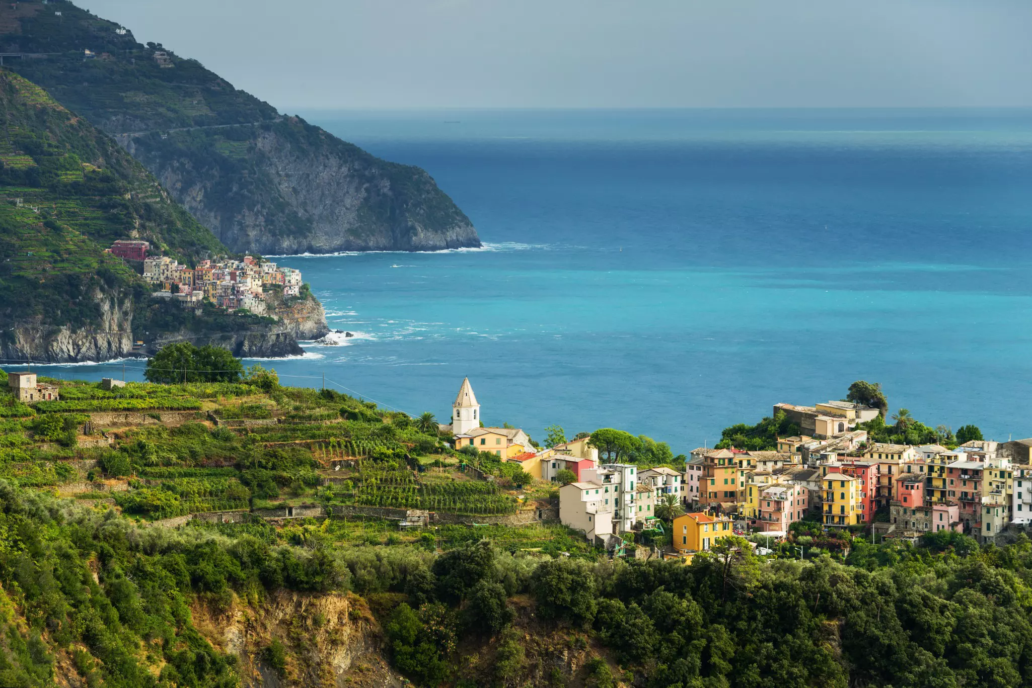 Overview of Corniglia and Manarola in the distance from the Sentiero Azzurro, Cinque Terre, Italy