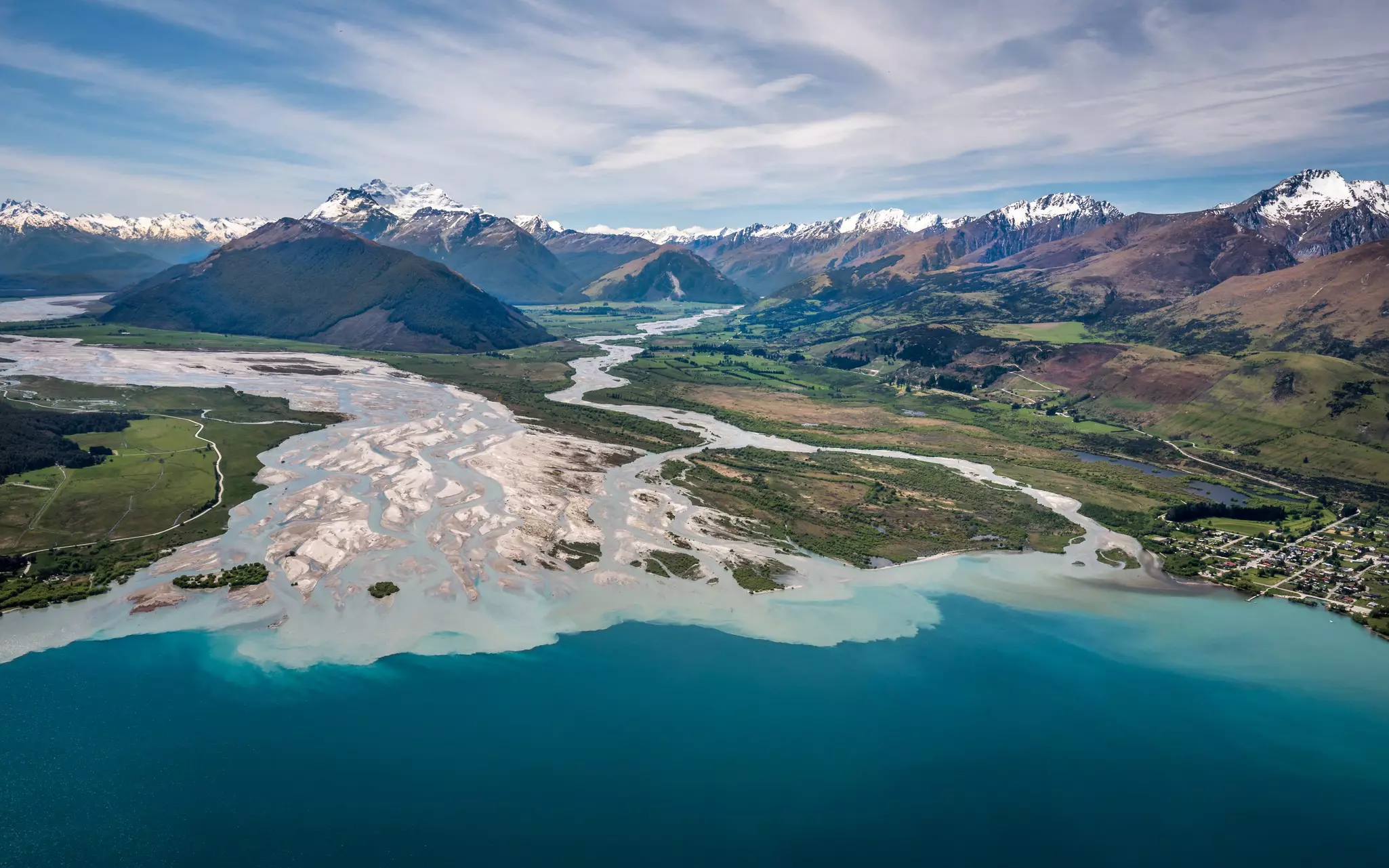 Aerial view of Glenorchy, Lake Wakatipu and Mount Aspiring at the base of Dart River and Rees River mouth near Queenstown, South Island, New Zealand.