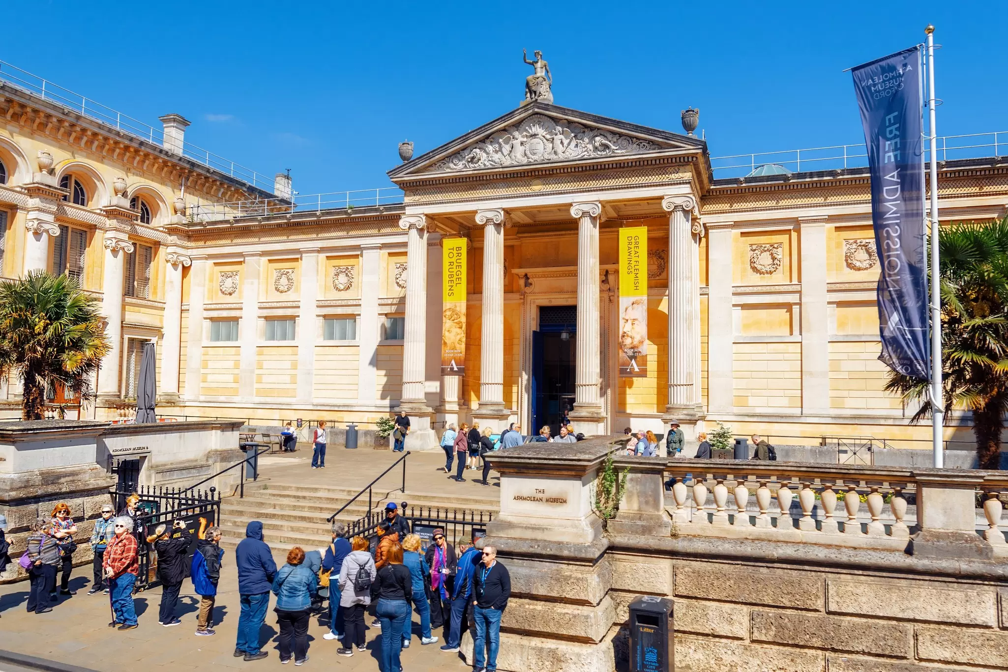 Exterior view of the Ashmolean Museum on a sunny day in Oxford, UK.