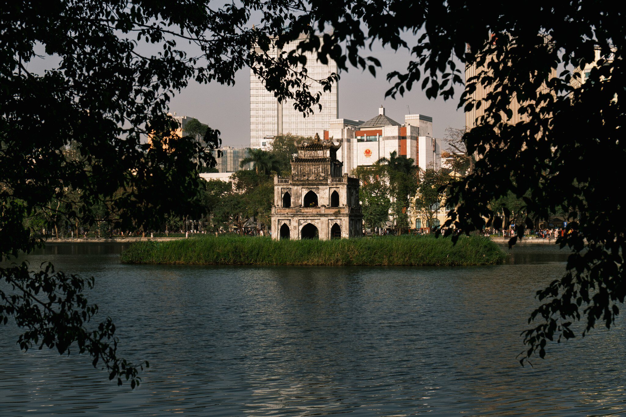 View of the Turtle Tower in Hoan Kiem Lake in Hanoi, Vietnam.