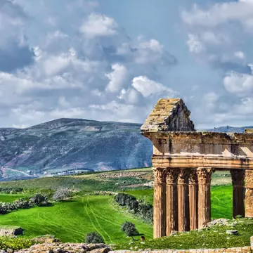 Spend a morning wandering the sprawling and often empty ruins of Dougga. Rosita So Image / Getty Images