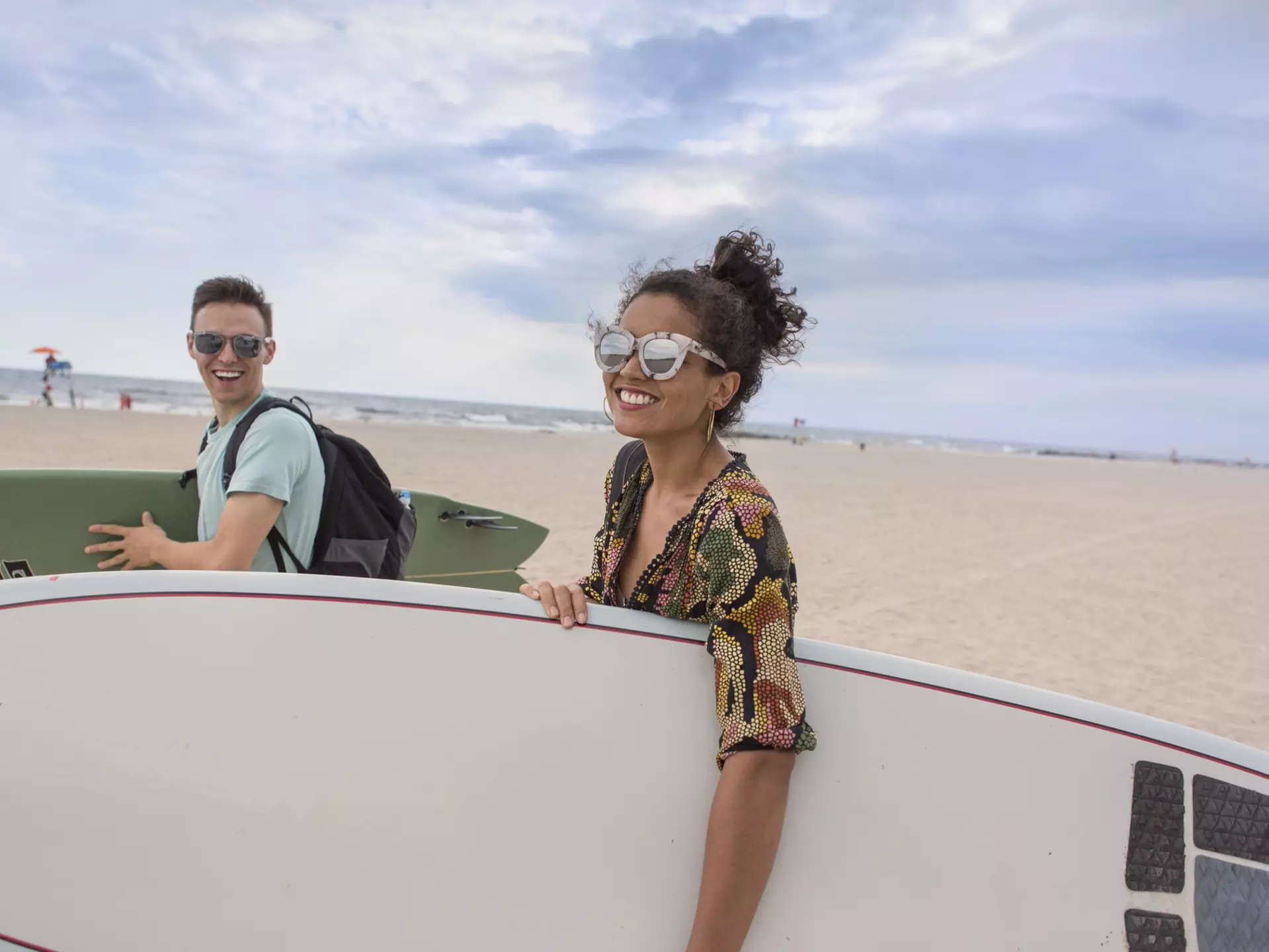 Young couple carrying surfboards on Rockaway Beach, New York State, USA
699108491
"20 to 24 years, 25 to 29 years, active lifestyle, american culture, athleticism, beach, bonding, both male and female, carefree, carrying, caucasian ethnicity, city break, coast, day, fitness, friendship, getting away from it all, happiness, head and shoulders, heterosexual couple, hispanic ethnicity, long island, multi-ethnic couple, new york state, outdoors, people in the background, recreation, rockaway beach, sea, sharing, side view, strolling, summer clothes, summer, sunglasses, surfboard, surfer, surfing, swimwear, togetherness, travel destination, two people, united states of america, vacation, vitality, water sport, wearing, young couple, young man, young woman, Rockaway Beach, Queens, New York, USA"