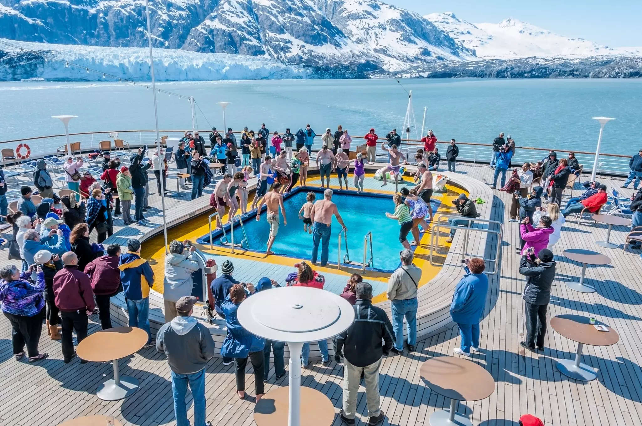 Cruise ship passengers take the Polar Bear Dip, into the aft deck pool.