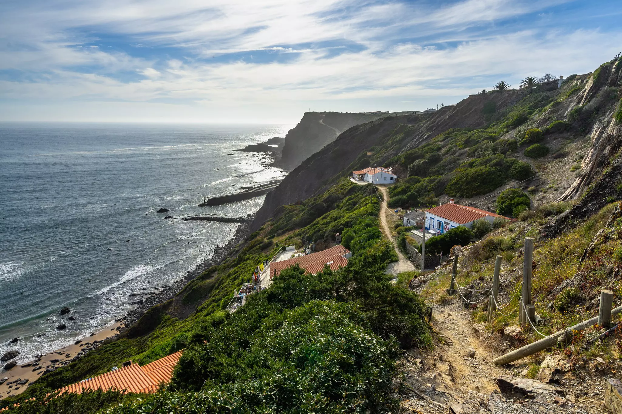 The path leads through cliffs above Praia de Arrifana © Francesco Bonino / Shutterstock