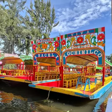 Trajinera or punt on the canals and floating gardens of Xochimilco Mexico City