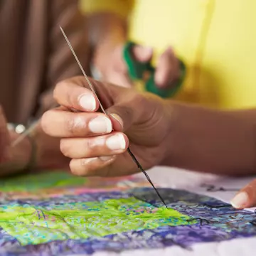 Quilting is often a collaborative effort in the USA. monkeybusinessimages / Getty Images
