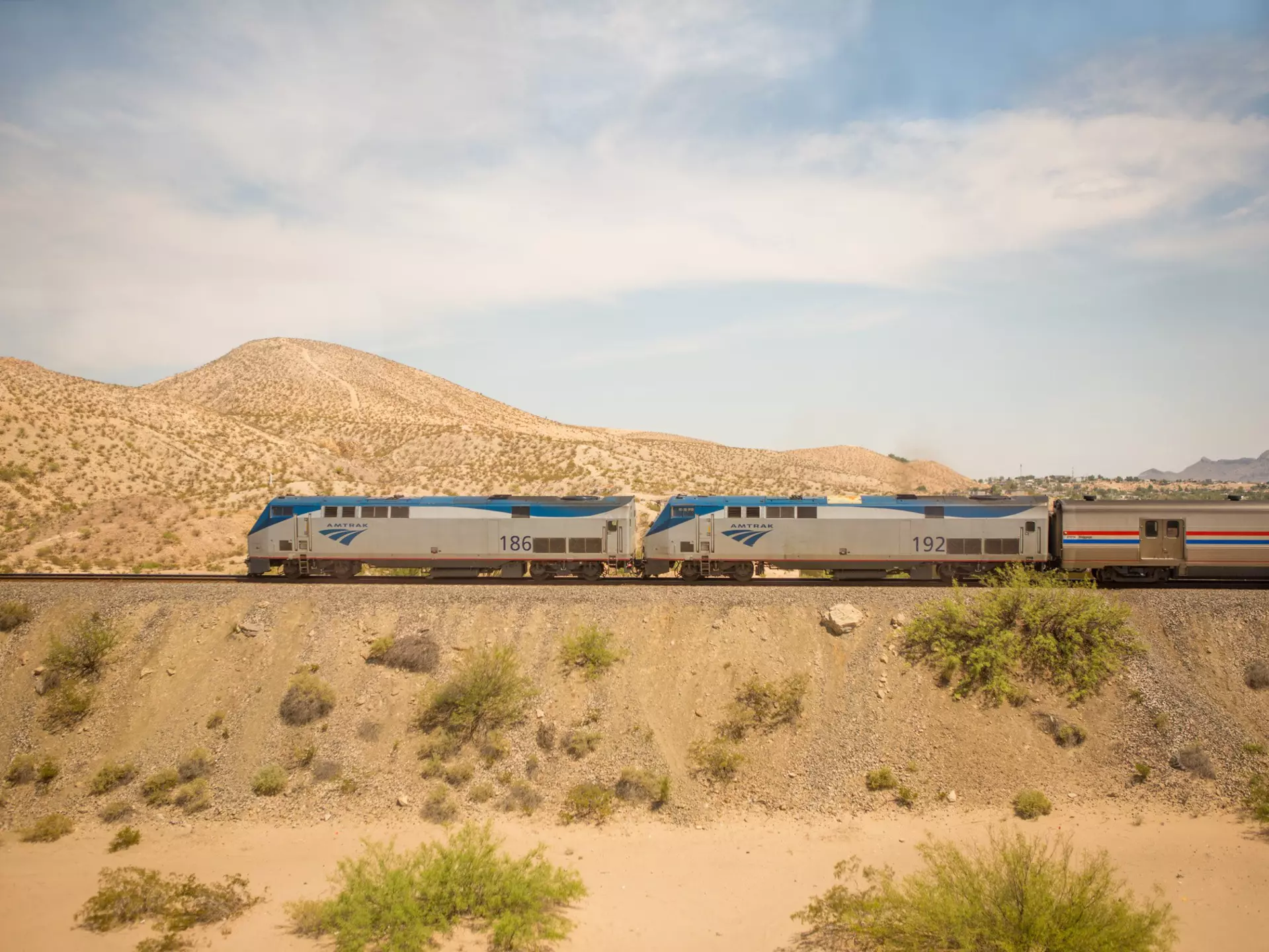 Amtrak train in the New Mexico desert © Kris Davidson / Lonely Planet