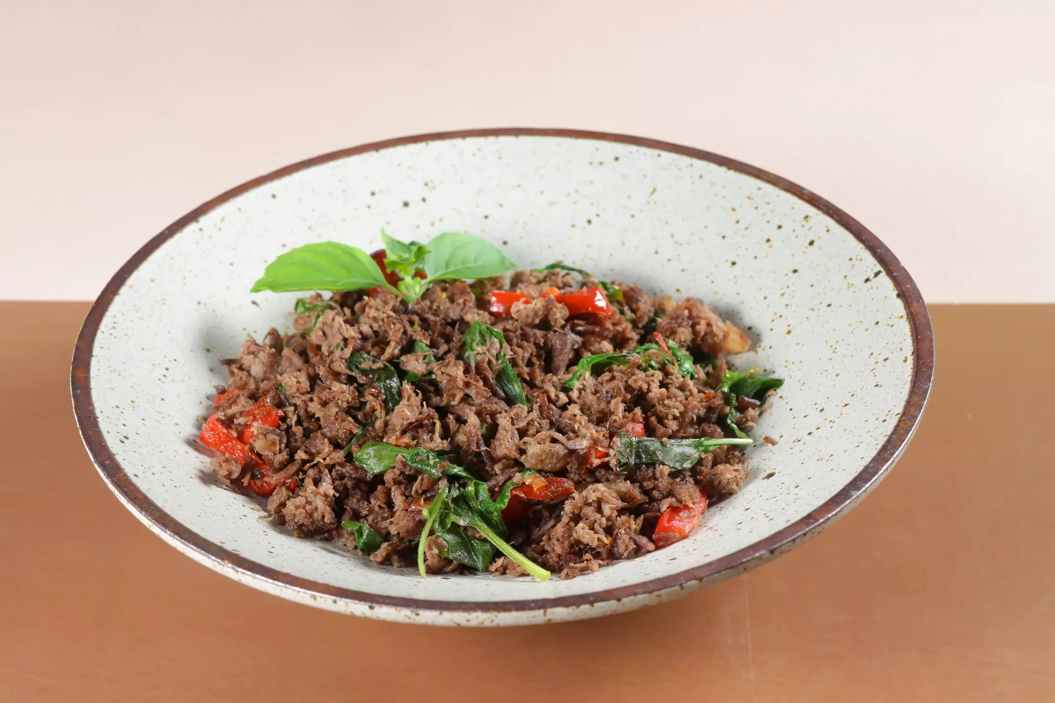 Pad Kra Pao is a Thai holy basil stir fry with ground beef