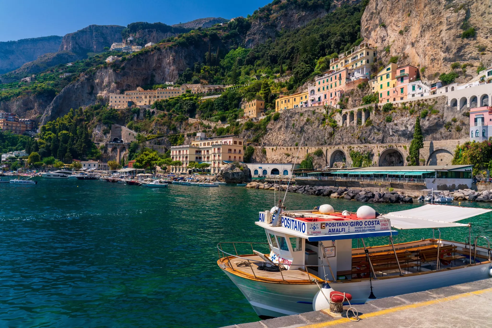 Beautiful view from harbor over Amalfi town in Italy.