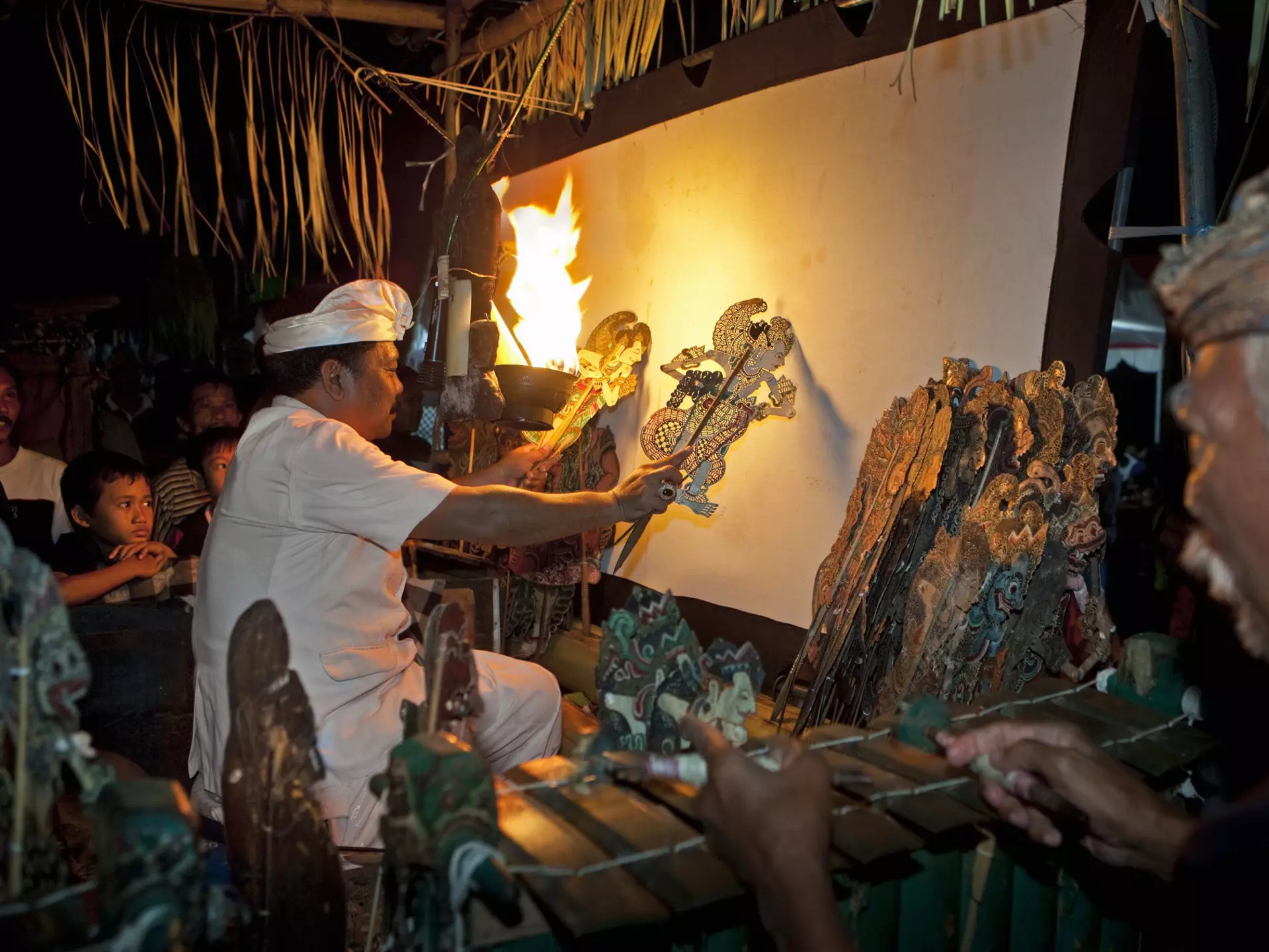 Behind the screen at a Wayang Kulit shadow puppet theater, Bali