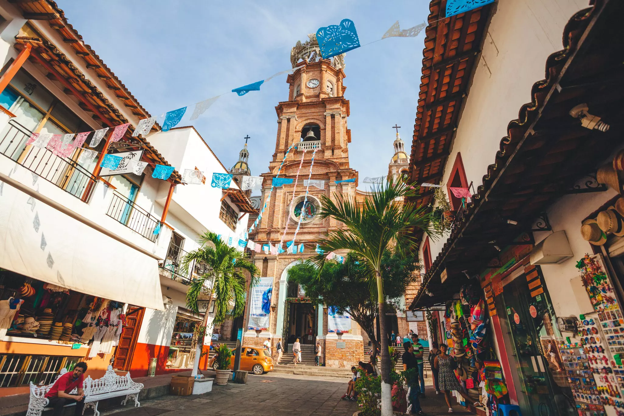 Puerto Vallarta, Mexico - December 28, 2016: Our Lady of Guadalupe Parish sits on a busy street filled with tourists and souvenir vendors.
637089068
Travel, Tourism, Souvenir, Market Vendor, Religion, History, Architecture, Travel Destinations, Tourist, Puerto Vallarta, Mexico, Church, Street, Town