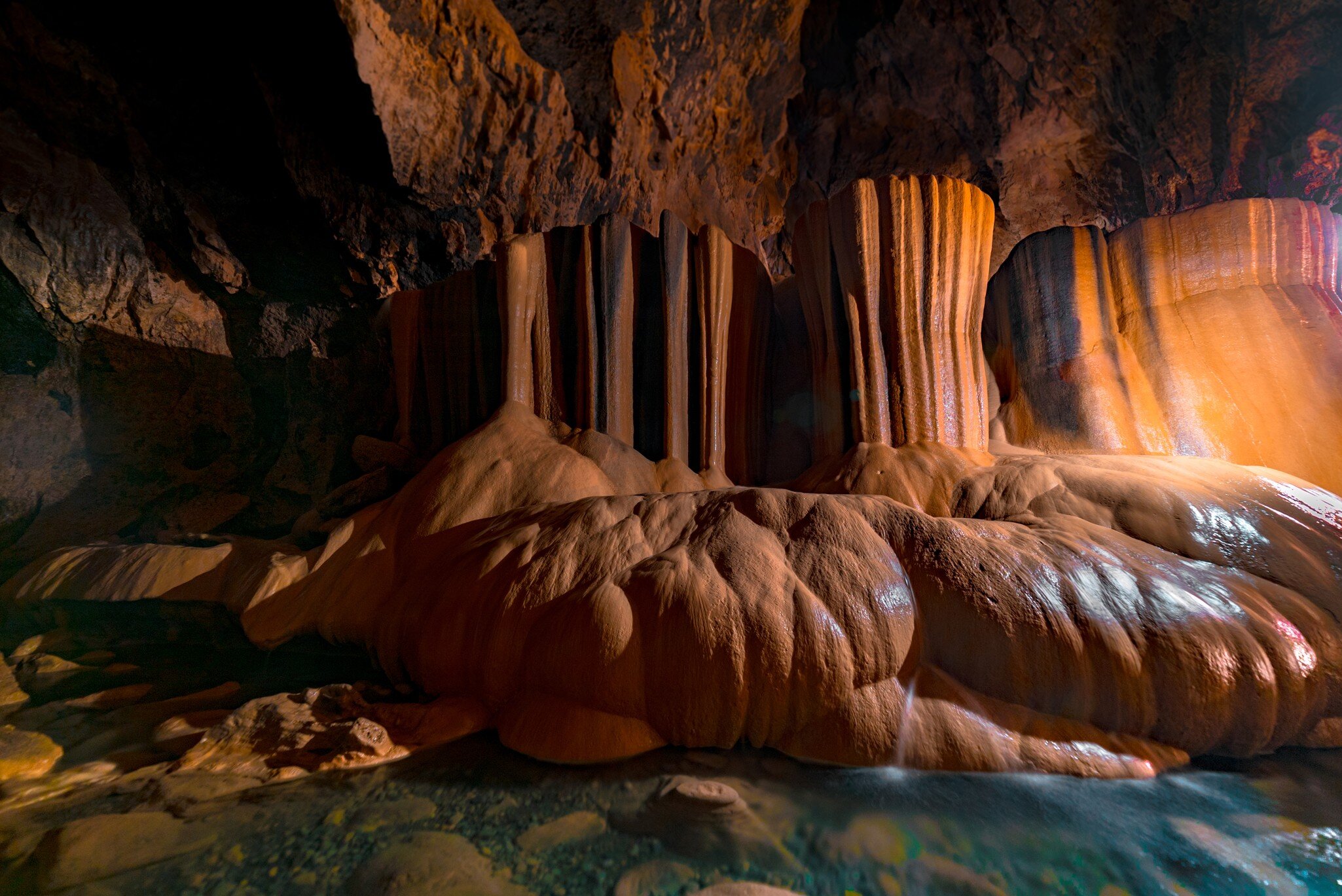 The dark and wet exploration of the beautiful Sumaguing Cave in the Philippians, Sagada, mountain province.; Shutterstock ID 1041613192;