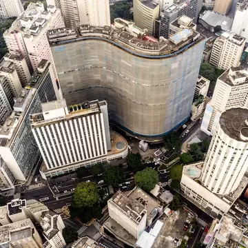 Aerial view of the curving Copan apartment block among high-rise towers in central São Paulo, Brazil
