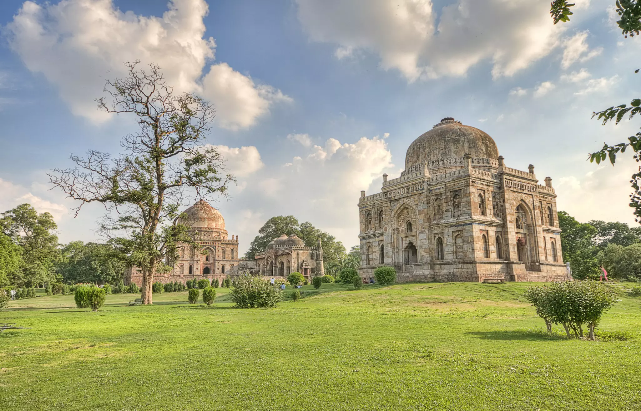 Two large Islamic-style tombs set in landscaped gardens.