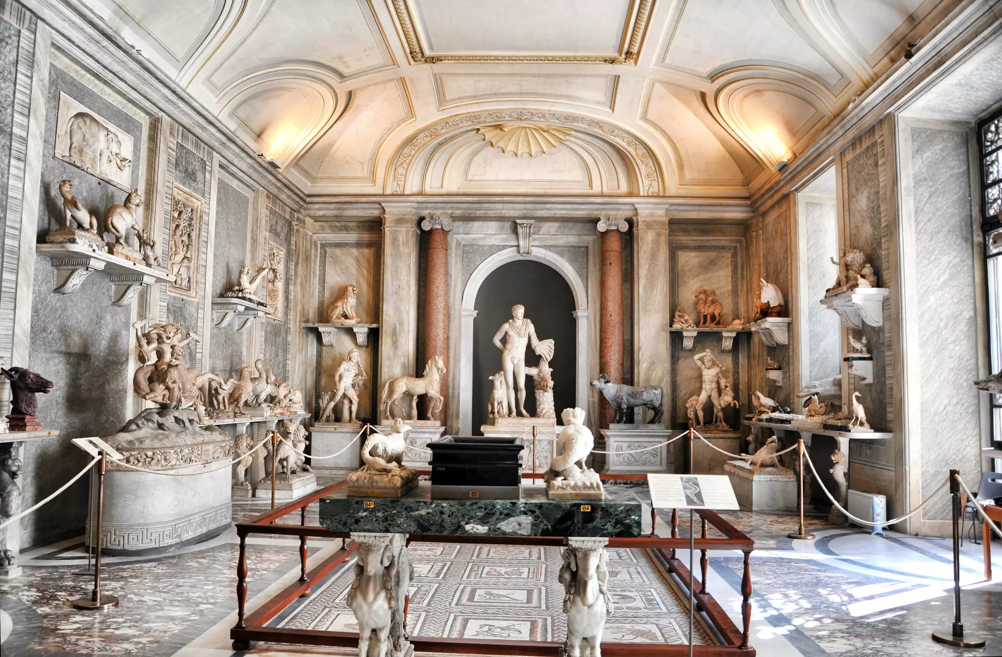 Statues and sculptures in the Sala degli Animali (the Hall of Animals) inside the Museo Pio-Clementino, which is part of the Vatican Museums in Vatican City, Rome, Italy.