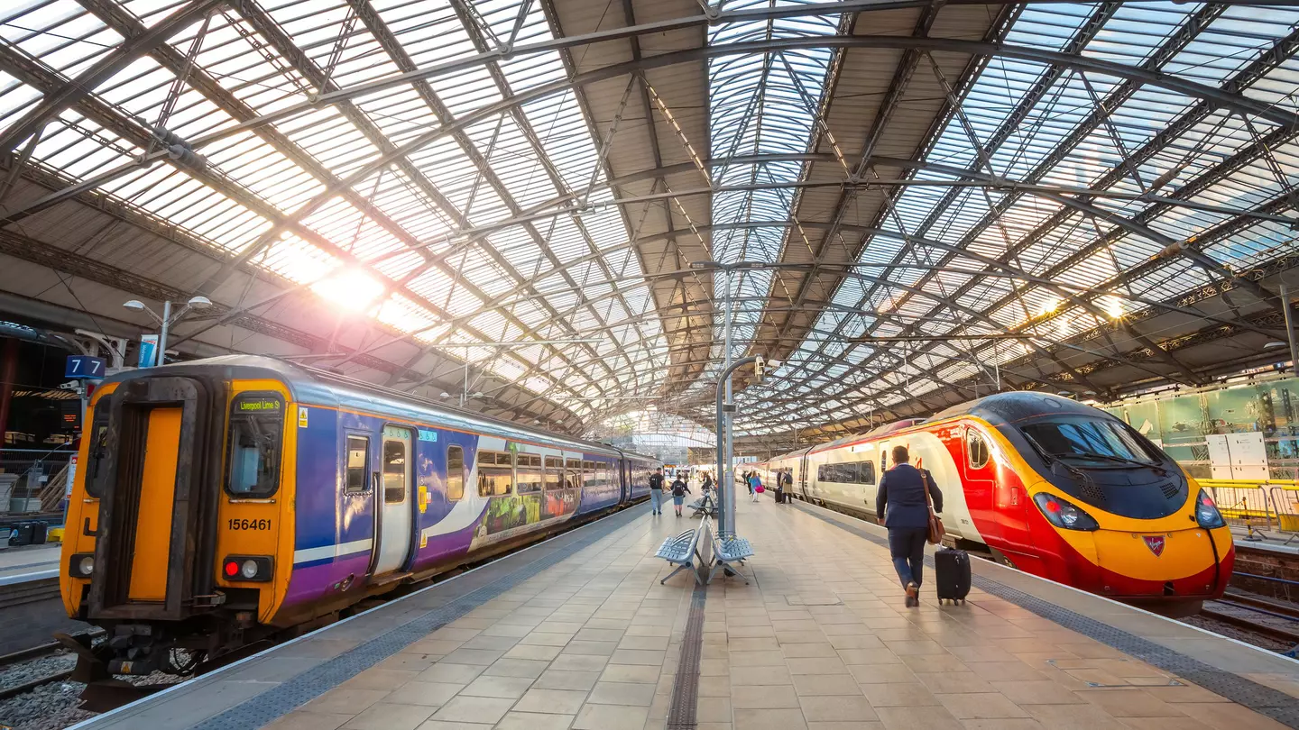 Two trains wait on platforms at Liverpool Lime Street terminus in Liverpool
