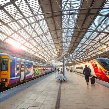 Two trains wait on platforms at Liverpool Lime Street terminus in Liverpool