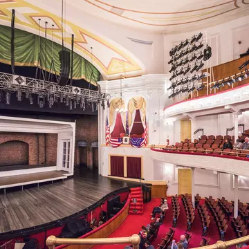 WASHINGTON - APRIL 12, 2015: Stage and seating of Ford's Theatre. The theater is infamous as the site of President Abraham Lincoln's assassination by John Wilkes Booth in 1865.