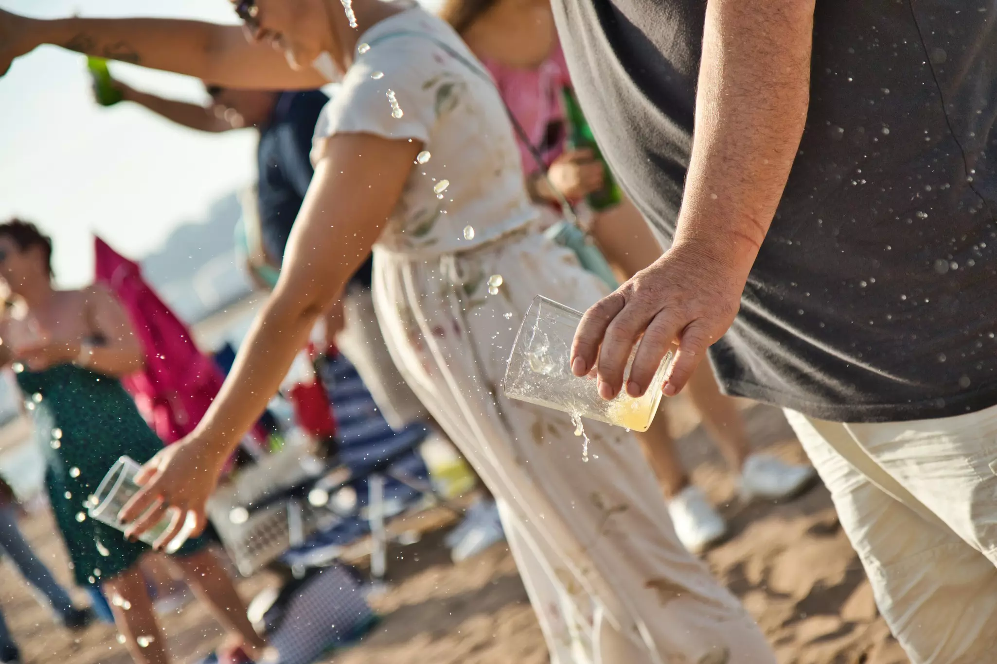 People pouring cider the traditional way at the Natural Cider Fest in Gijón, Asturias, where 9721 persons beat the former record of persons 'escanciando' (pouring cider in a glass) simultaneously.